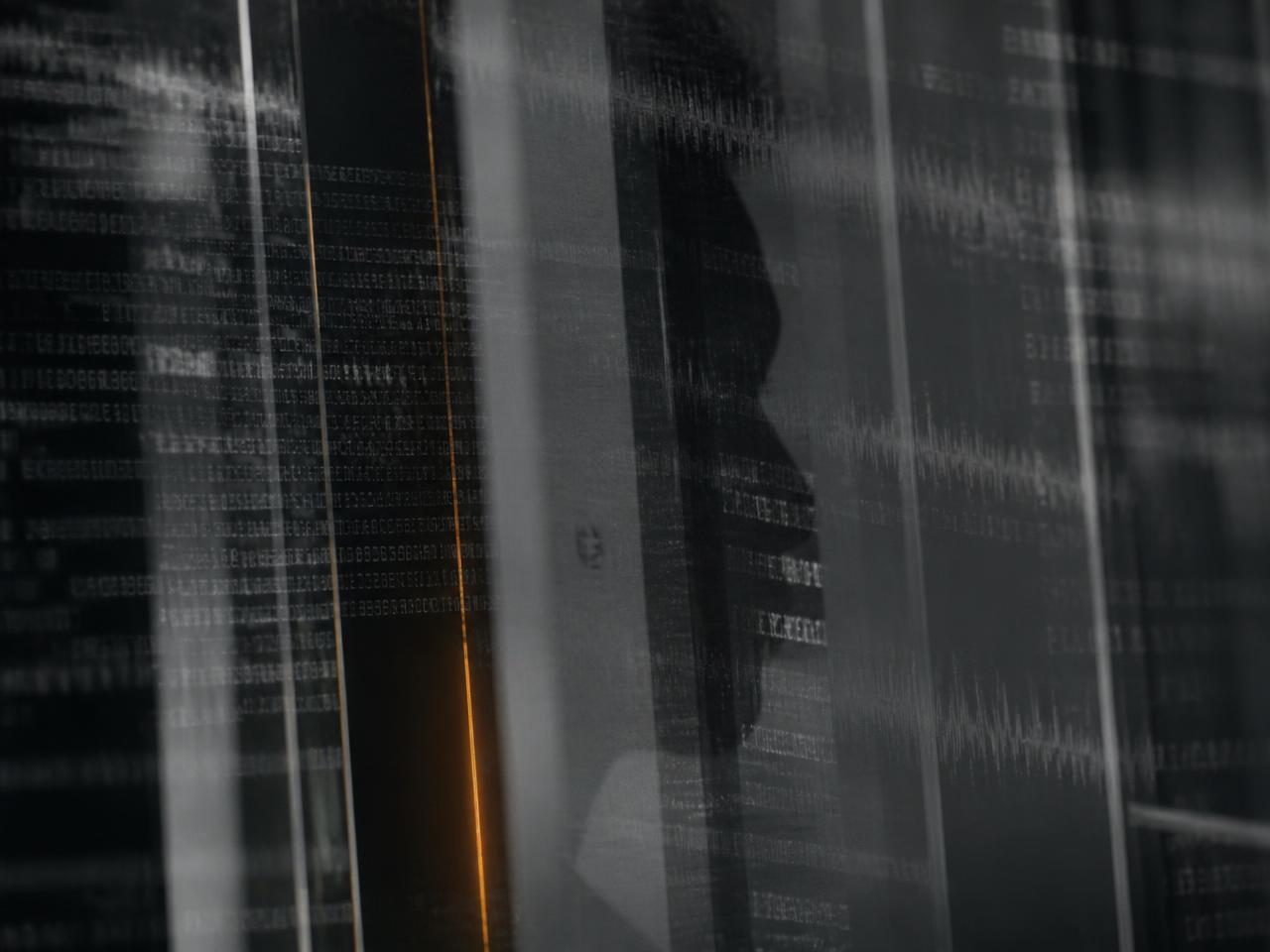 Layered translucent panes with distorted text and a single orange line